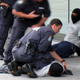 Image for article titled Bank Robbers Are Wearing iPods Now?